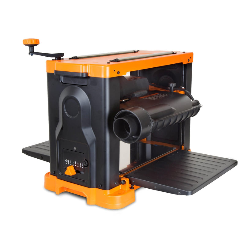 WEN PL1326 planer feeding a board through the cutterhead